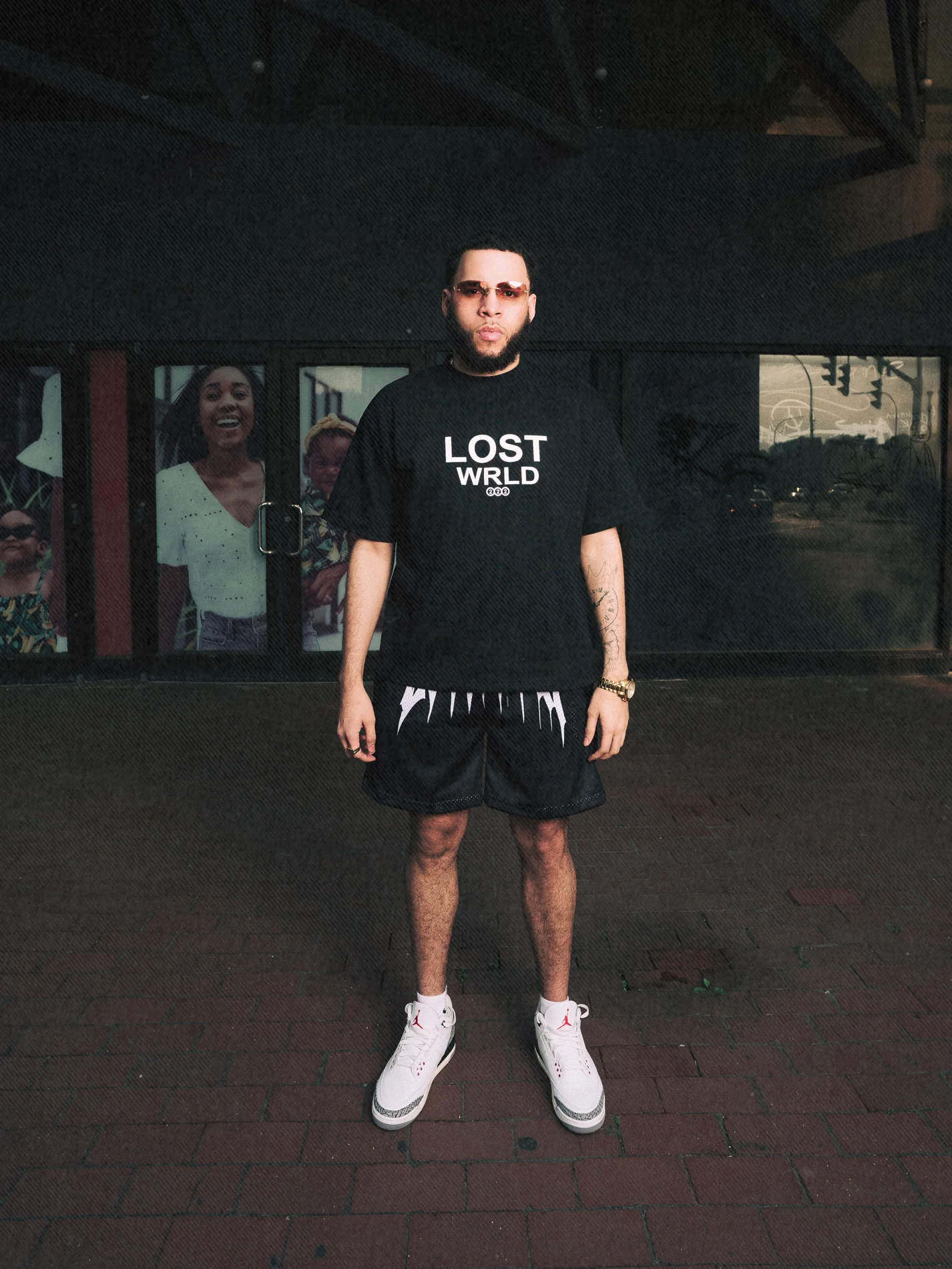 Stacked Logo Tee — Black